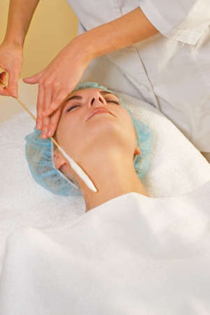 Facial cryogenic massage in spa salon