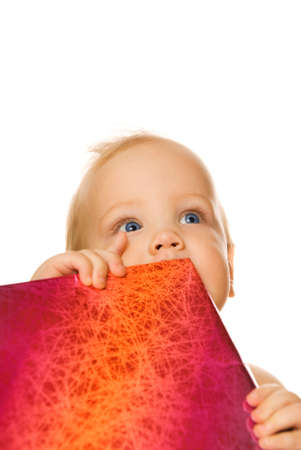 Adorable baby with a gift box isolated on white backgroundの写真素材