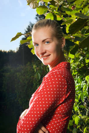 Beautiful blond girl outdoorsの写真素材