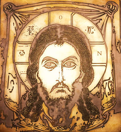 Portrait of Jesus made on metal plateの写真素材