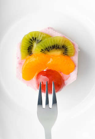 Tasty low-calorie fruit cake isolated on white backgroundの写真素材