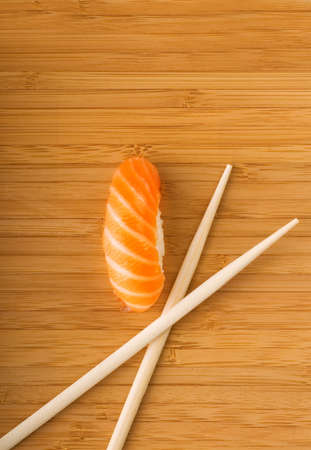 Sashimi with fresh salmon on bamboo plateの写真素材