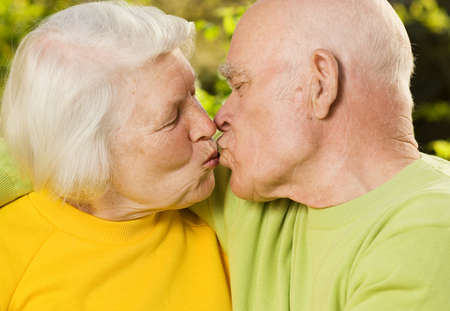 Seniors couple kissing each other