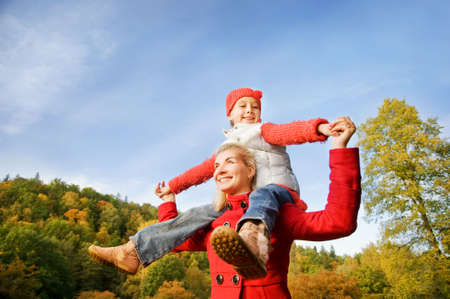 Mother and daughter having fun outdoors