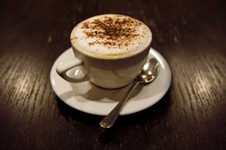 Cup of cappucino (toned in sepia)の写真素材