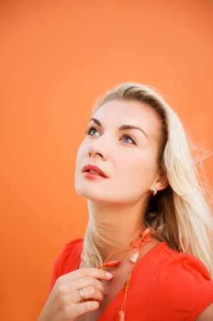 Thoughtful young woman close-up portraitの写真素材