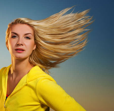 Beautiful fitness trainer outdoorsの写真素材