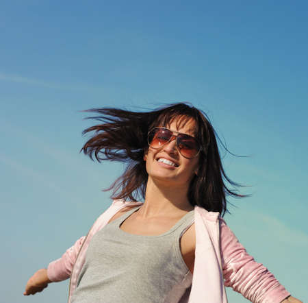 Young woman relaxing outdoorsの写真素材