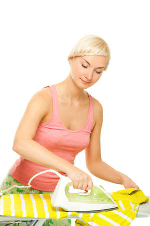 Beautiful woman ironing clothes. Isolated on white background

の写真素材