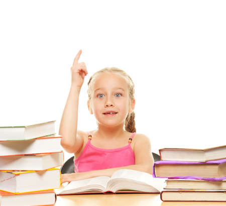 Little schoolgirl raised her hand to answer question

の写真素材
