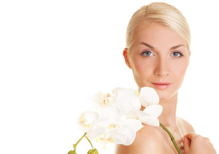 Beautiful young woman with white orchid

の写真素材