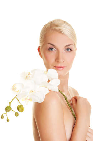 Beautiful young woman with white orchid

の写真素材