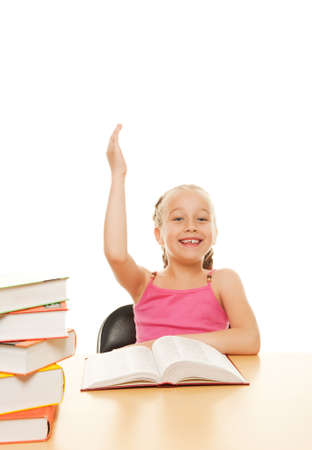 Little schoolgirl raised her hand to answer question

の写真素材