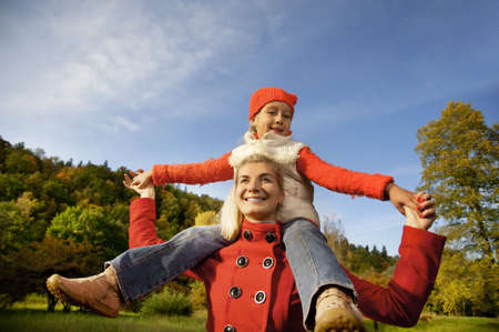 Mother and daughter having fun outdoors


