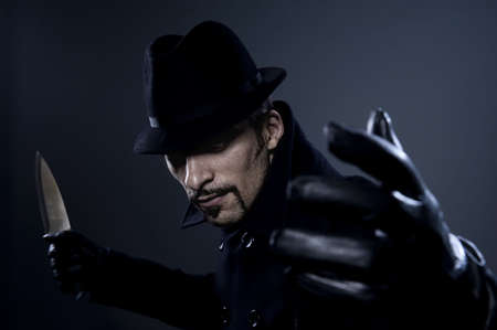 Scary man with a knife 
の写真素材