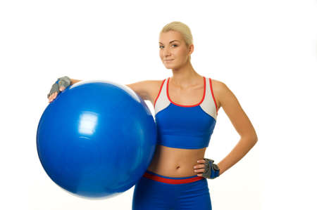 Beautiful fitness trainer with a ball 

の写真素材