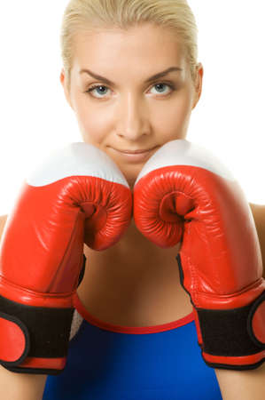 Young woman with a red boxing gloves 

の写真素材