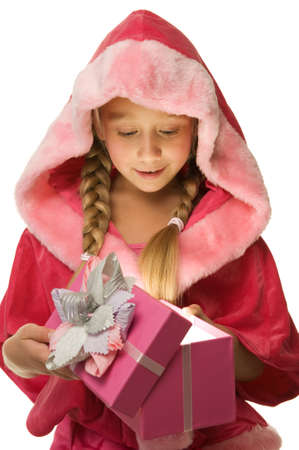 Little Christmas girl open her present 

の写真素材