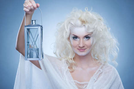 Snow queen with a lanternの写真素材