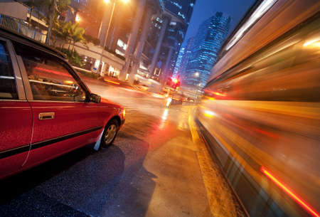 Fast moving bus at nightの写真素材