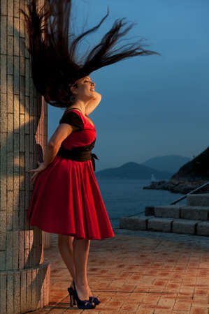 Beautiful brunette woman outdoors 

の写真素材