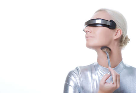 Beautiful cyber woman applying make-up 

の写真素材
