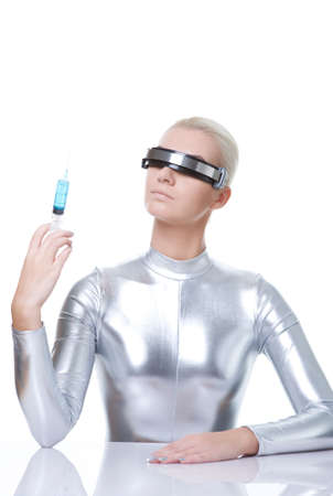 Beautiful cyber woman with syringe 

の写真素材