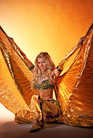 Attractive woman performing arabic danceの写真素材