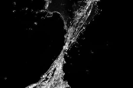 Stylish water splash. Isolated on black background の写真素材