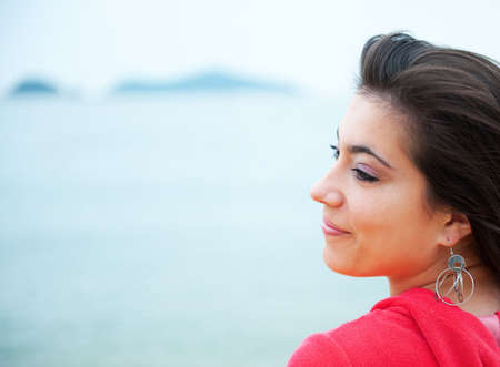 Beautiful brunette woman outdoors の写真素材