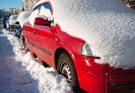 Snow covered carsの写真素材