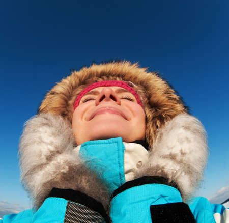 Beautiful woman enjoying winter day の写真素材