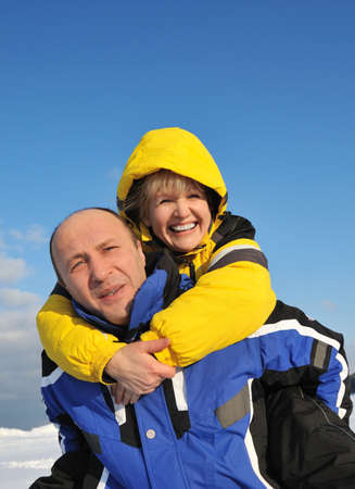 Middle aged couple having fun on a winter dayの写真素材