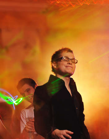 Men dancing in the night clubの写真素材