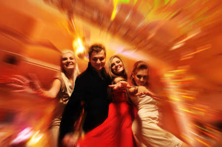 People dancing in the night club の写真素材