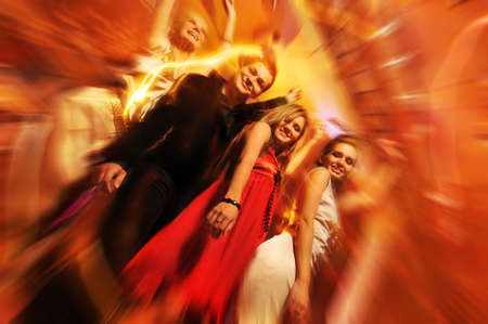 People dancing in the night club の写真素材