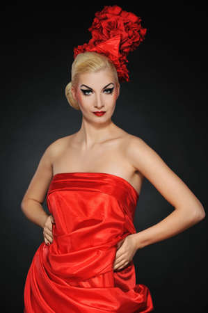 Beautiful lady in red dressの写真素材