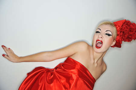 Screaming lady in red dressの写真素材