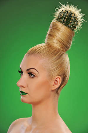 Woman with cactus in her hair 
の写真素材