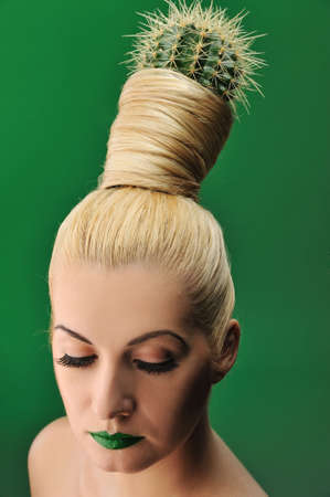 Woman with cactus in her hair 
の写真素材