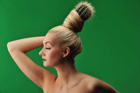 Woman with cactus in her hair 
の写真素材