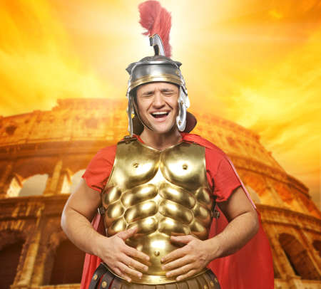 Roman legionary soldier in front of coliseumの写真素材