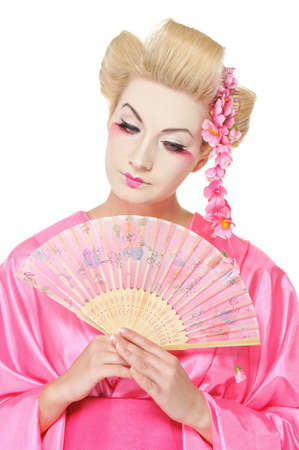 Beautiful geisha with a fanの写真素材