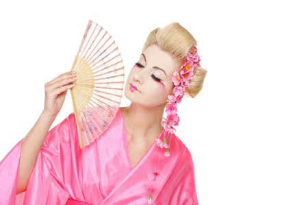 Beautiful geisha with a fanの写真素材