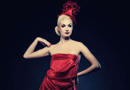  Portrait of a beautiful lady in red hat の写真素材