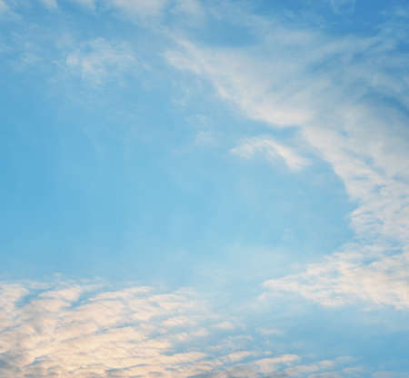 Blue sky with fluffy clouds