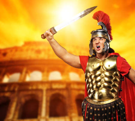 Roman legionary soldier in front of coliseumの写真素材