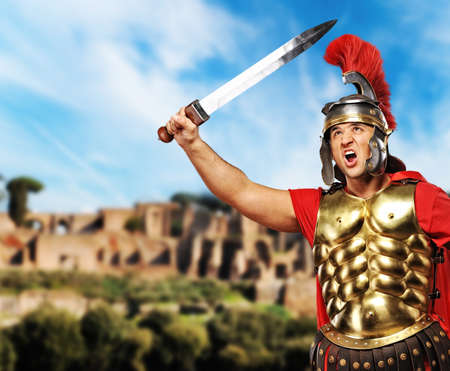 Roman legionary soldier in front old city of Romeの写真素材