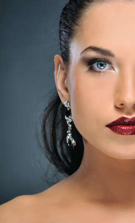 Close-up portrait of a beautiful brunette womanの写真素材