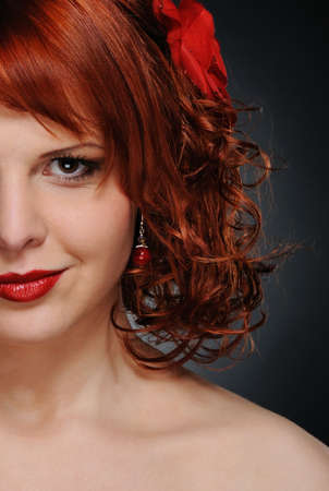 Portrait of an attractive redhead womanの写真素材
